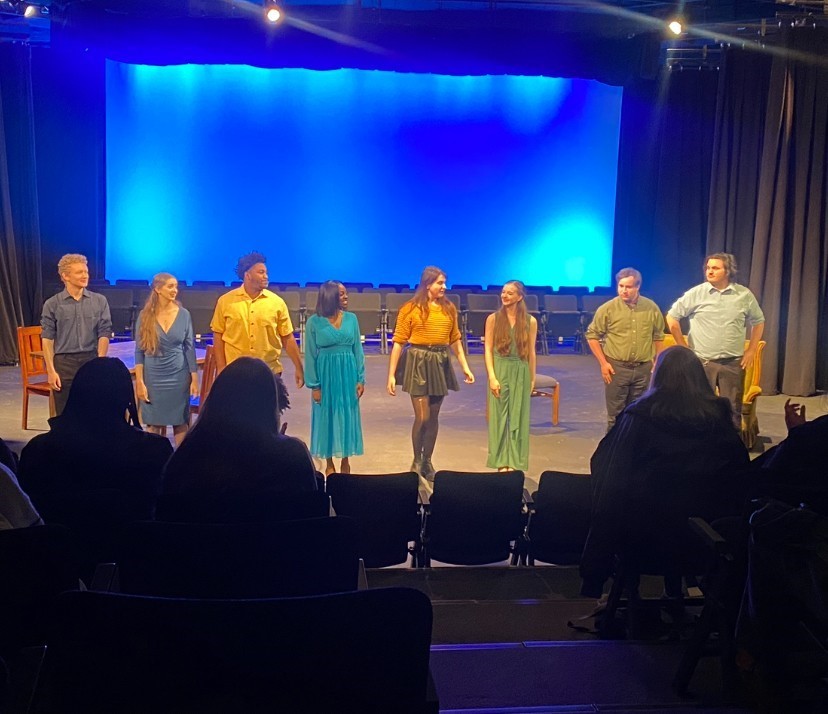 The cast of “New Millennium” Student Showcase is shown standing side by side toward the end of the production (Photo by junior Aumnibus writer Kniya Potts).
