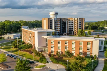 AUM partners with Faulkner to temporarily house in second recent agreement